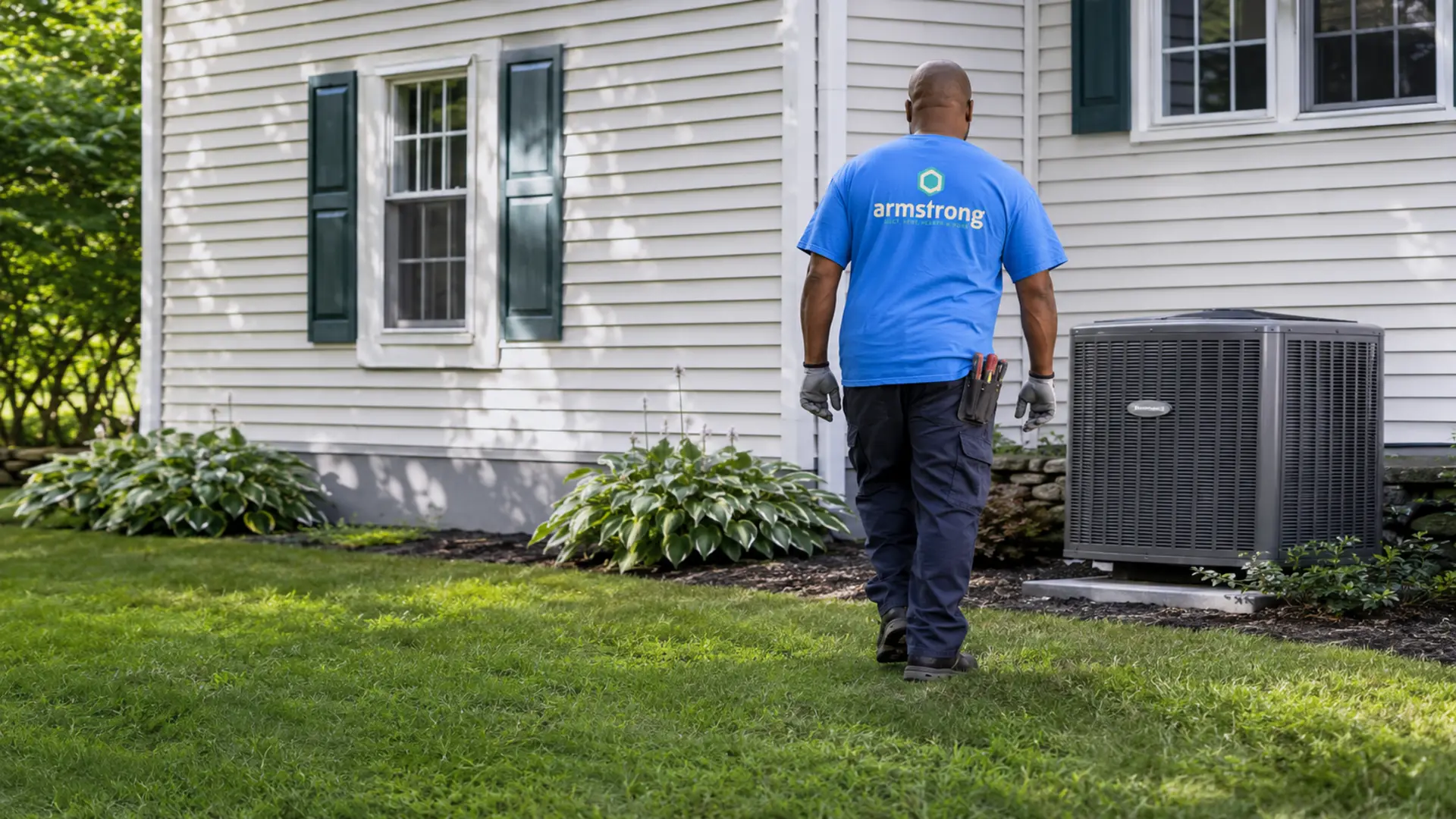 Technician cleaning A/C evaporator coils on a home HVAC unit